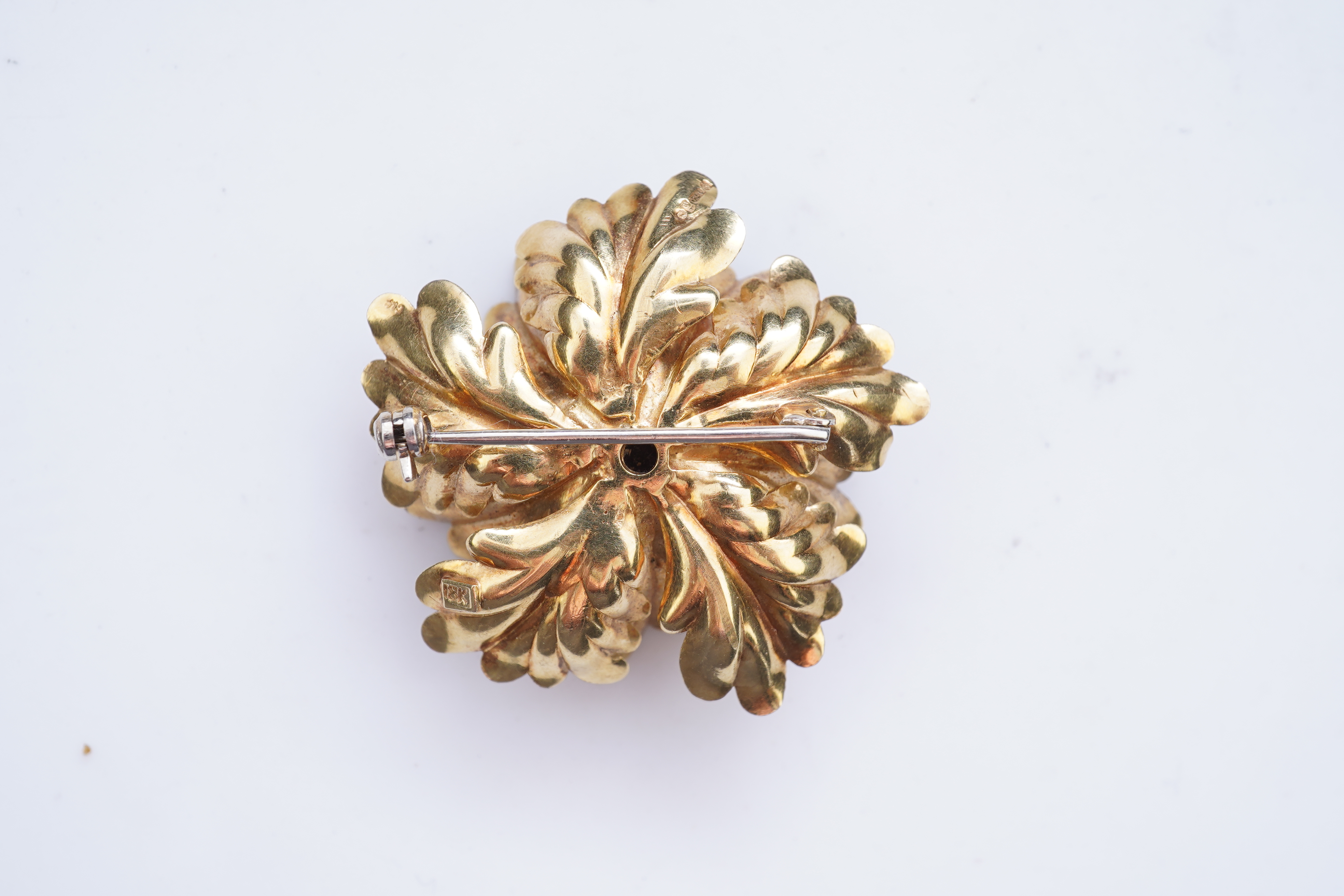 A gold and sapphire brooch, third quarter 20th century